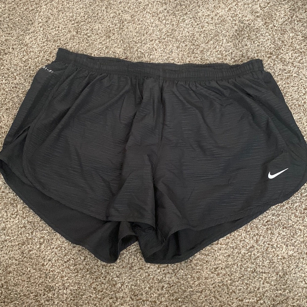 Black Nike running shorts
